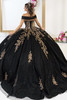 Black and gold ball gown with traditional long train, back view