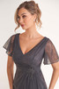 Detail view of flutter sleeves and beaded waist applique on K278068U