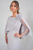 Detail view of beaded flower accent and cape on K288006