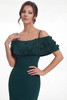 Detail view of 3D beaded flowers and portrait neckline on K288057