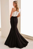 Back view of Montage M4206 ivory and black mermaid gown with covered buttons