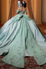 Sage satin ball gown with detachable double-loop bow, back view