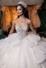 Ivory champagne sweetheart quinceanera ball gown with tiered skirt, front view
