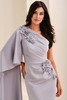 Close-up of Cameron Blake CB826 floral appliqué and asymmetrical neckline