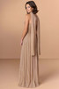 Back view of Christina Wu Elegance 17268 champagne beaded gown with detachable shawl.