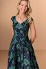 Close-up of Christina Wu Elegance 17277 floral brocade bodice with side bow detail.