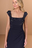 Close-up of Christina Wu Elegance 17287 midnight beaded neckline and cap sleeves.