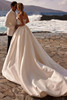 Back view of Arabela wedding gown with train and lace-up back