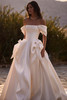 Front view of Milla Nova Elara Mikado A-line wedding dress with oversized bows
