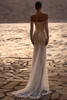 Back view of Emerald lace wedding dress with sheer train