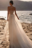 Back view of Esmera with detachable tulle train