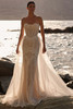 Bride wearing Esmera with detachable tulle train