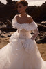 Bride wearing Evalisse with detachable off-the-shoulder sleeves