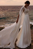 Bride wearing Milla Nova Fawna with chiffon scarf and dramatic train