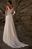 Back view of Ilenia satin wedding dress with sweeping train