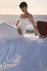 Bride wearing Milla Nova Liora with detachable ruched tulle sleeves