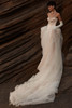 Side view of Milla Nova Lumiere princess wedding dress with layered tulle skirt