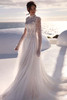 Front view of Milla Nova Mirette high neck lace wedding dress with tulle skirt