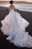 Back view of Myrelia wedding dress with flowing tulle train