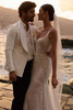 Side view of Orabella fit-and-flare wedding dress with shimmering lace