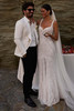 Bride wearing Milla Nova Orabella beaded lace wedding dress with cathedral veil