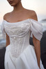 Close-up of Seraphine basque-waist corset with pearl off-the-shoulder sleeves