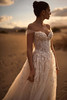 Side view of Solenne gown with sweetheart neckline and 3D floral appliqués