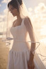 Tousaint wedding dress paired with matching bridal veil