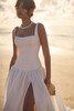 Side view of Tousaint dress with square neckline and side slit