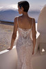 Back view of Velour dress with lace train and pearl back accessory