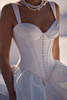 Detail view of Whisper corset bodice with visible boning and pearl trim