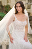 Close-up of Christina Wu 15892 square neckline bodice with beaded lace and 3D floral appliqués
