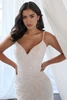 Close-up of Christina Wu 15906 beaded lace bodice with pearl embellishments and spaghetti straps