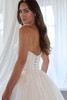 Back detail of Christina Wu 15913 lace-up corset and sparkling organza skirt