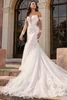Front view of Christina Wu 15932 fit and flare wedding dress with detachable lace sleeves