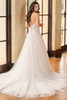Back view of Christina Wu 15942 gown with flowing tulle skirt and chapel train