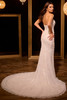 Back view of 15957 dress with lace-up back and long train