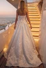 Back view of Karson wedding dress with lace-up back and cathedral train