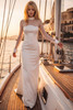 Front view of Randy Fenoli Kay bridal bodysuit with sheer high neckline