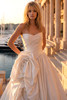 Close view of Randy Fenoli Kennedy ruched basque waist bodice and oversized rose accent