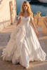 Front view of Randy Fenoli Kennedy satin ball gown with statement rose detail