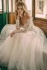 Close view of Randy Fenoli Ladonna detachable lace sleeves and tulle skirt