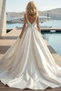 Back view of Larinda dress with V-back and buttons down the train