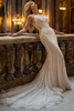 Side view of Lennox gown showing allover beadwork and fit-and-flare silhouette