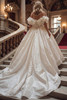 Back view of Lisa dress with detachable wrap and oversized 3D rosettes