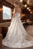 Back view of Lorelei dress with covered buttons and flowing lace train