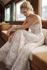 Side view of Lorelei dress showing lace skirt and floral appliques