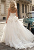 Back view of Louisa dress with statement bow and covered buttons
