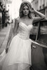 Side view of Louisa organza ball gown with layered skirt