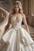 Close view of Lux beaded basque-waist bodice and sweetheart neckline